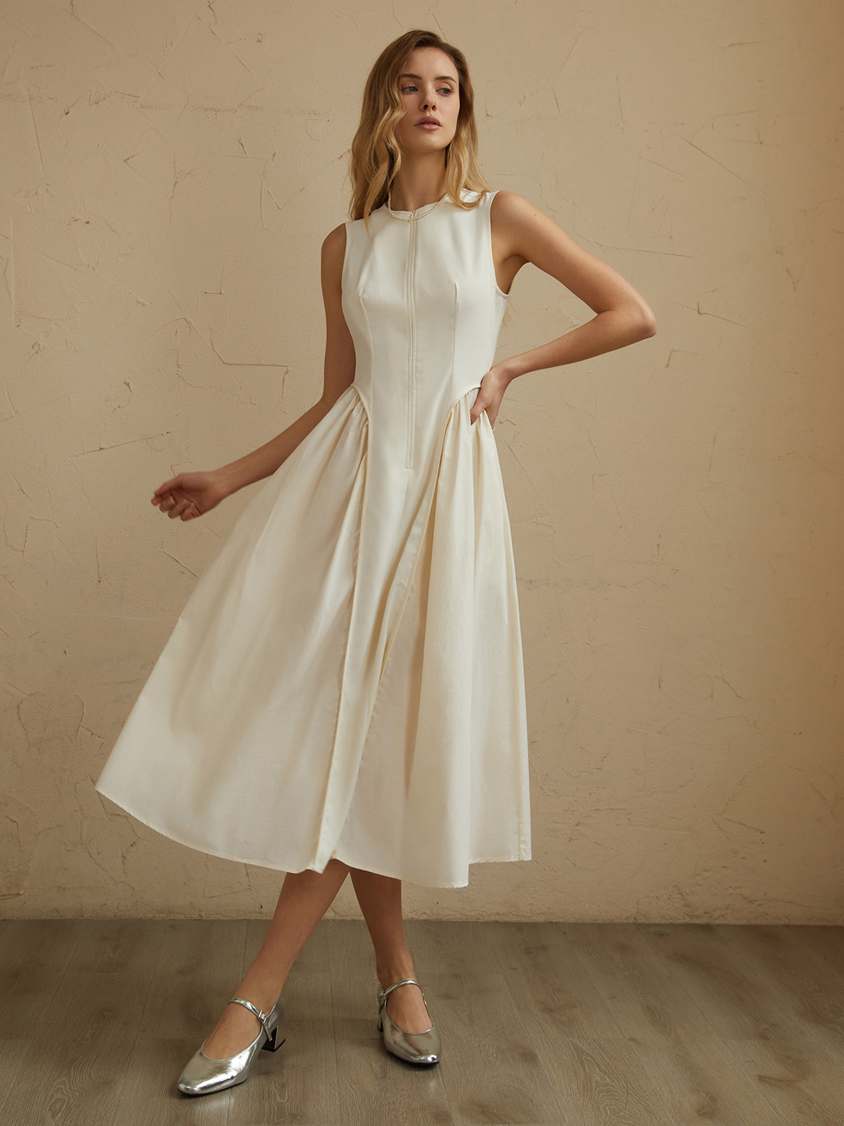 Robe midi plissée sans manches à poches