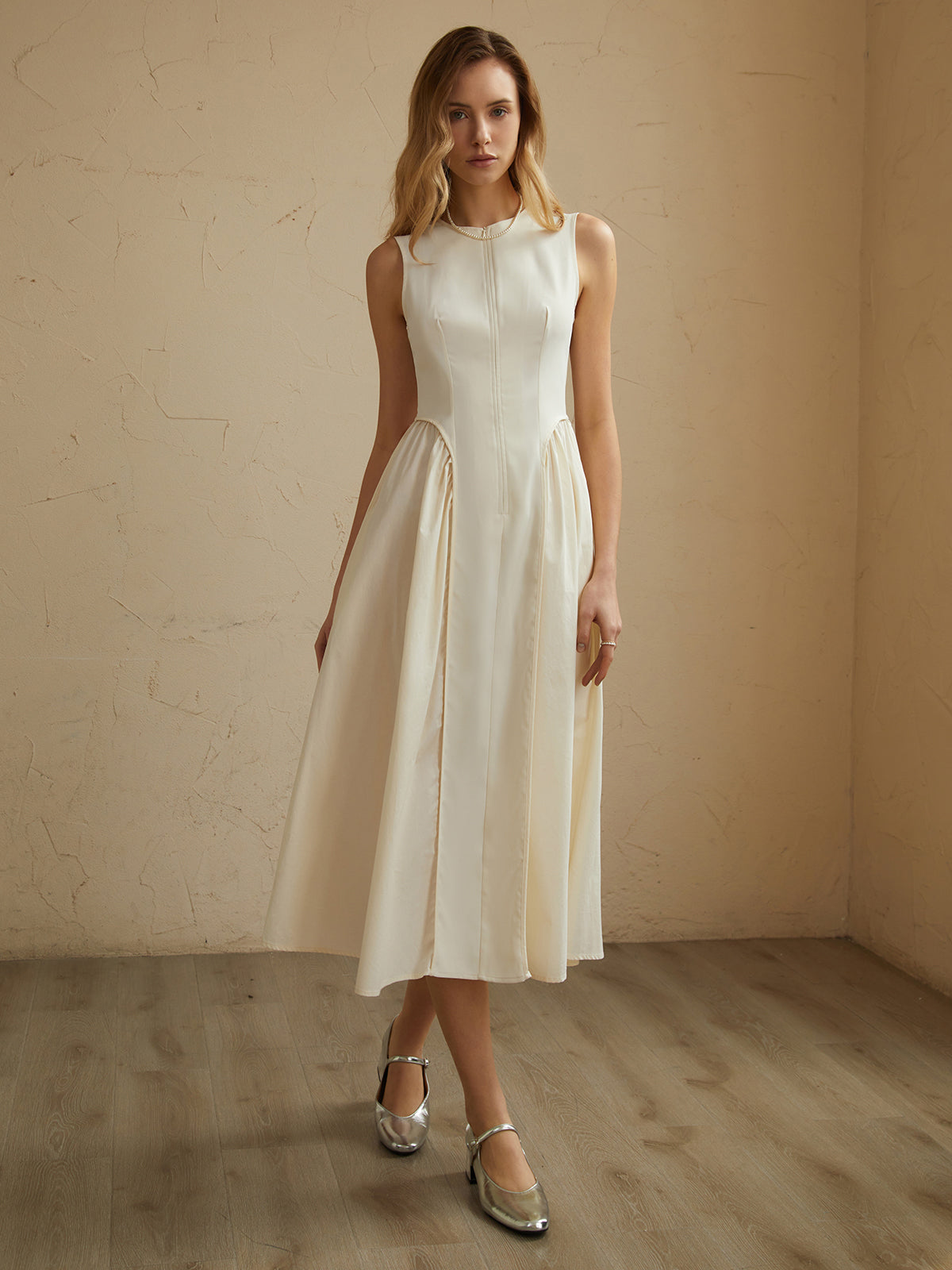 Robe midi plissée sans manches à poches