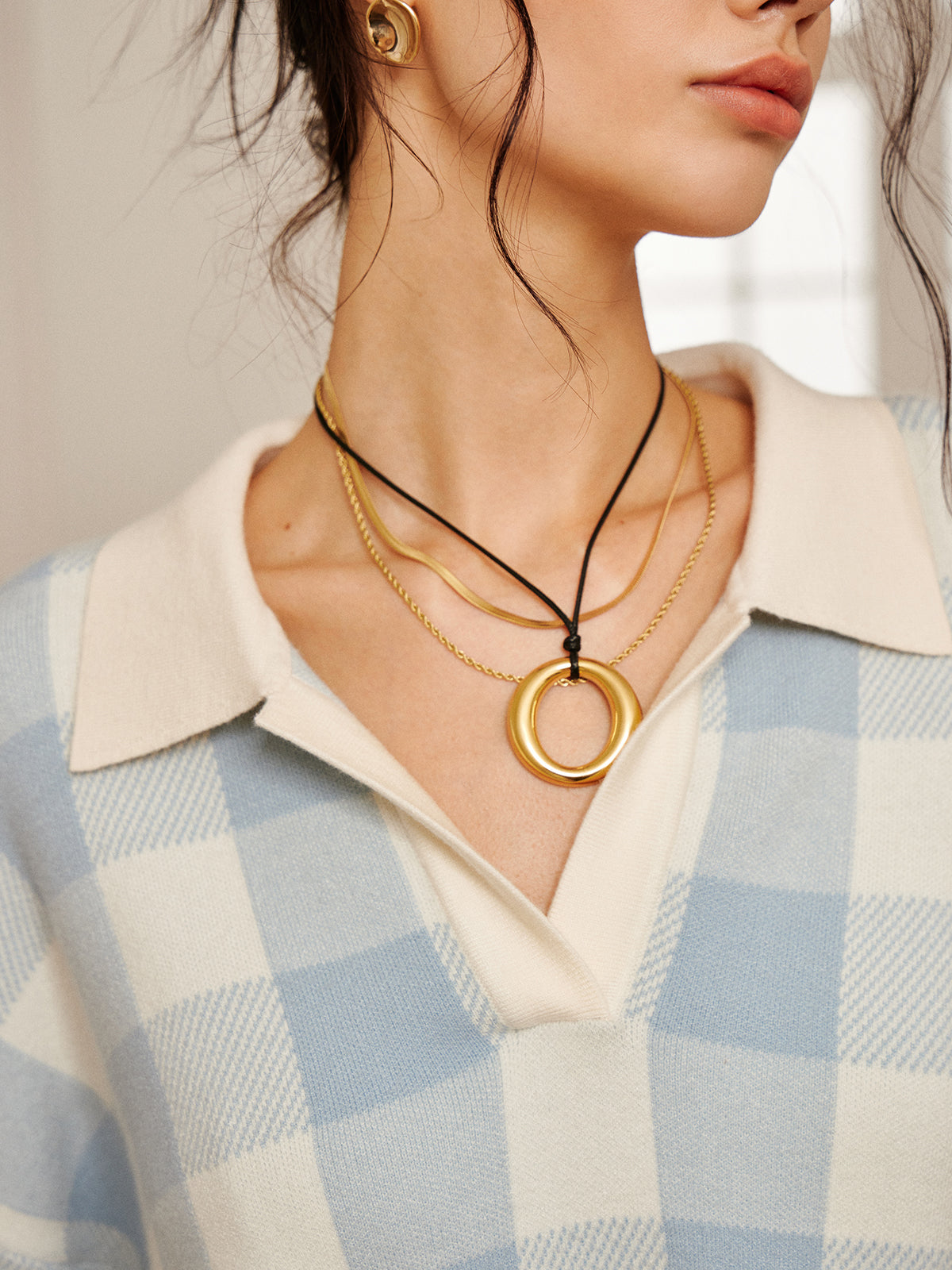 Ensemble pull polo à carreaux