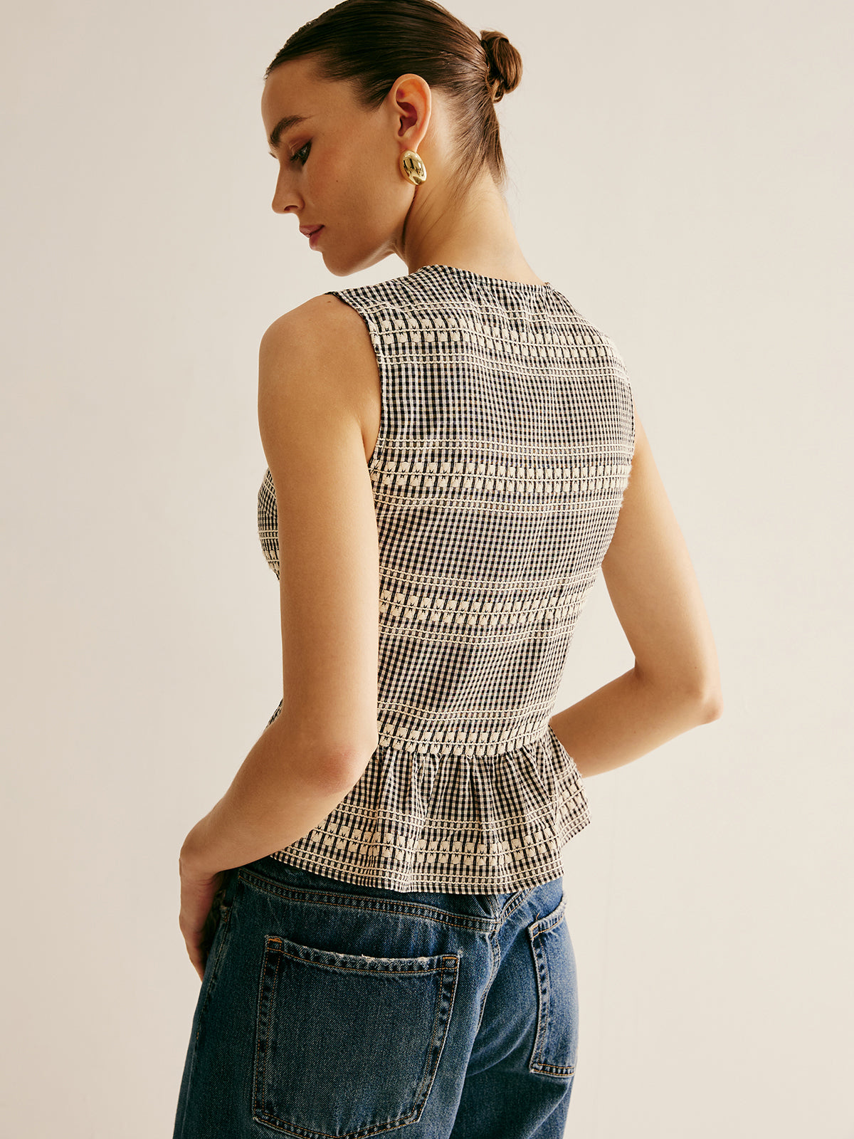 Débardeur à carreaux à volants et nœud sur le devant