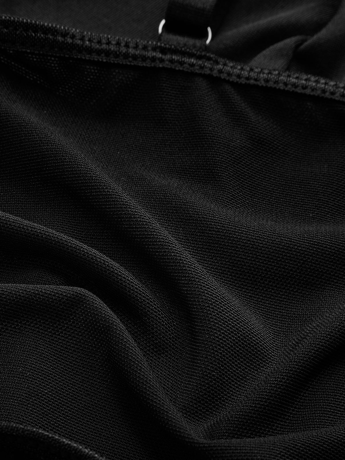 Haut corset à pois en maille semi-transparente