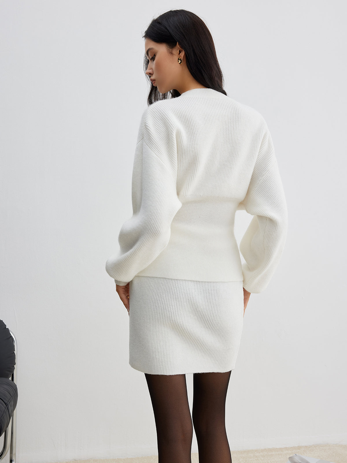 Eleganter gerippter Strick-Minirock