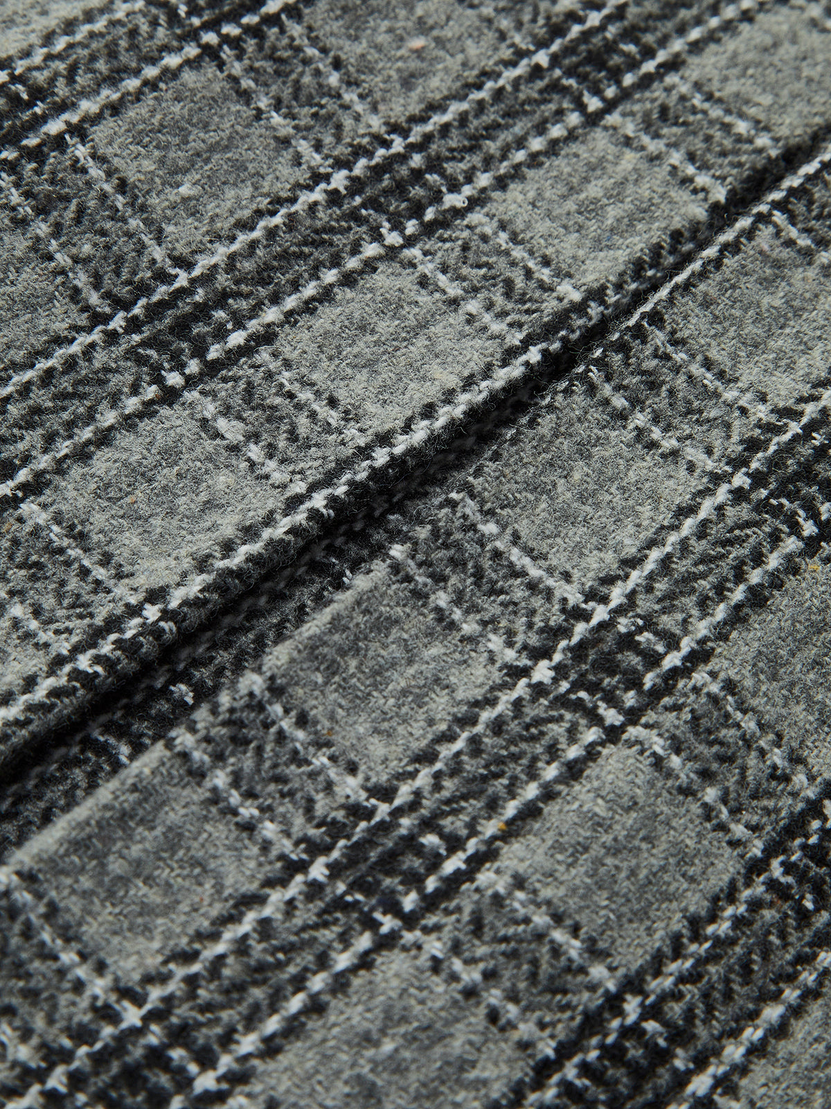 Mini-jupe plissée à carreaux avec fermeture éclair