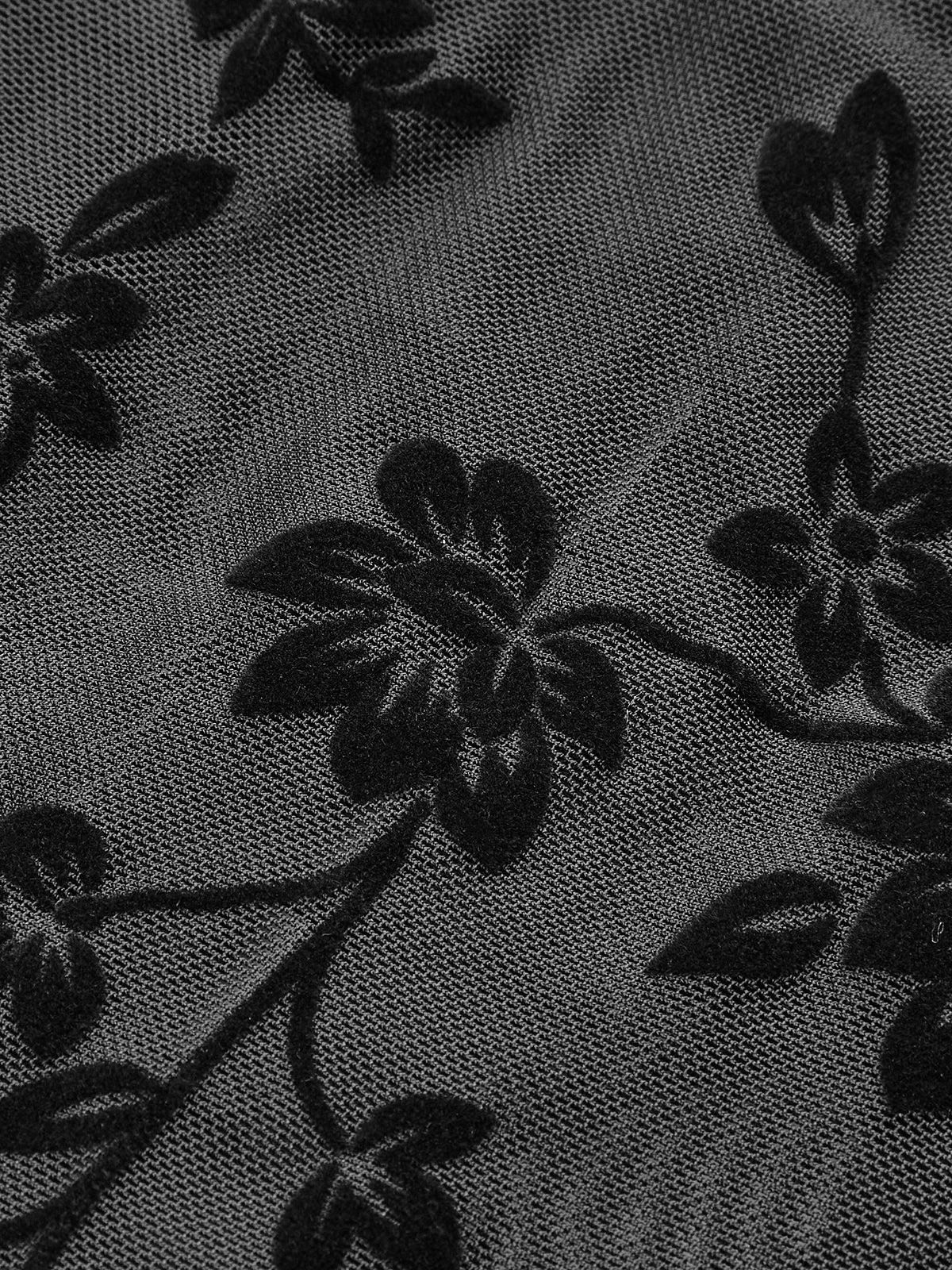 Corset structuré en résille transparente à motif floral