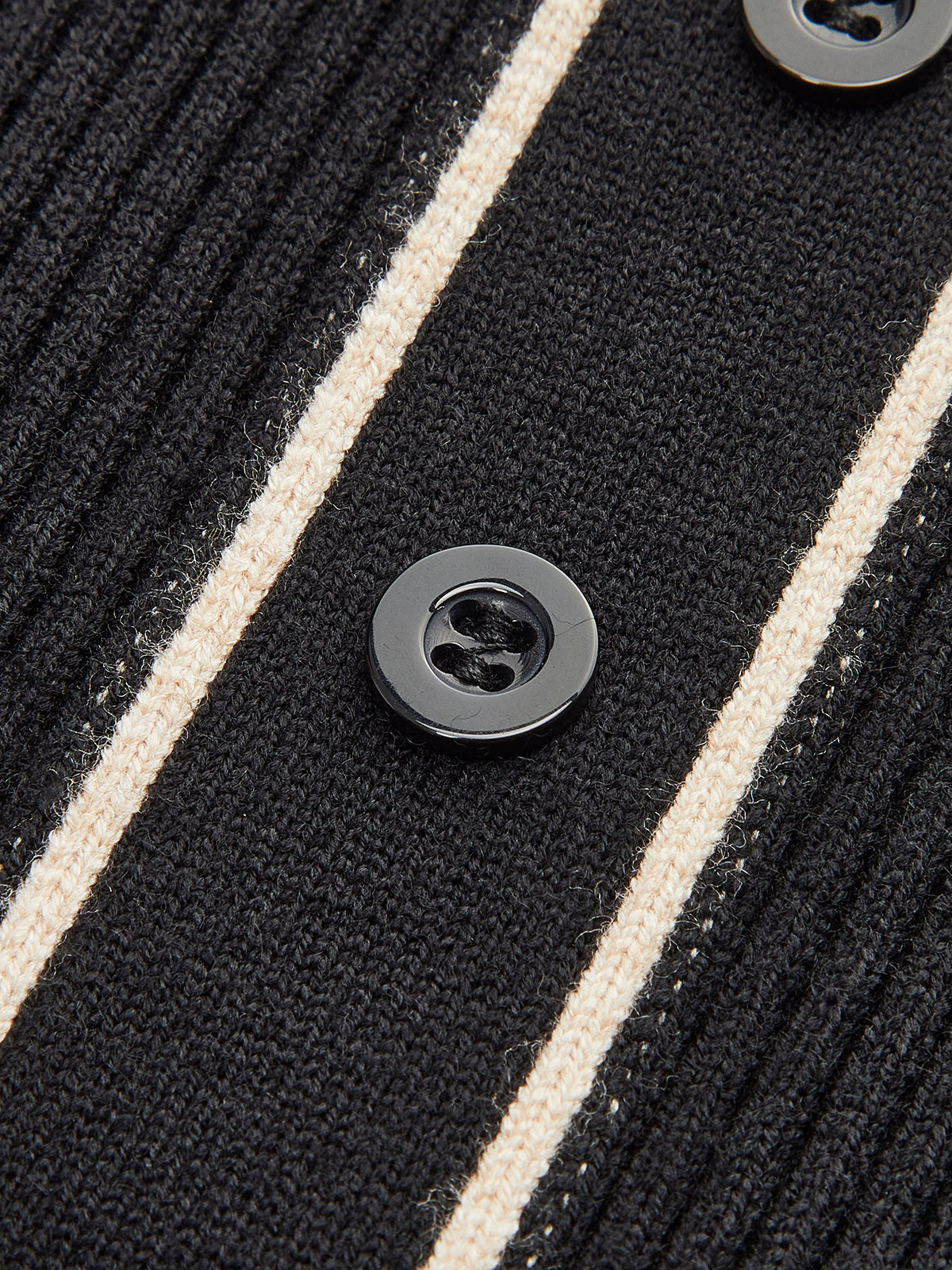 Robe pull à carreaux ceinturée