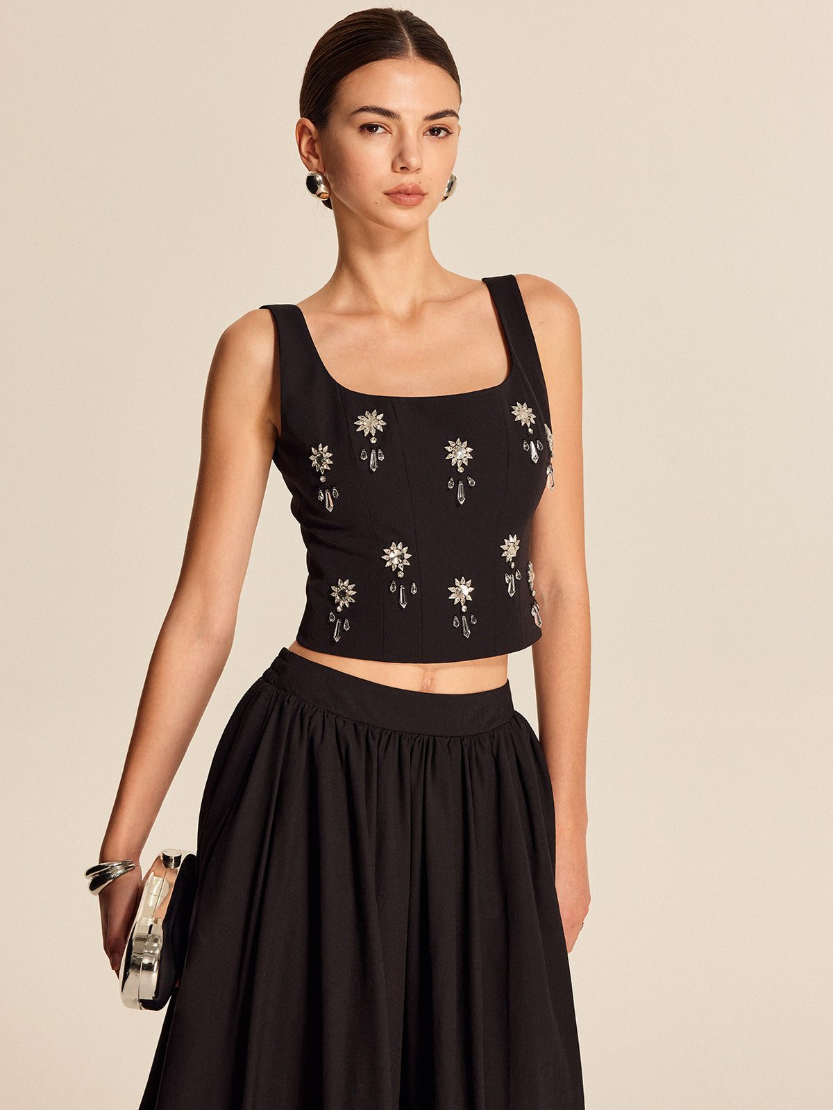 Haut à fermeture éclair au dos orné de cristaux floraux