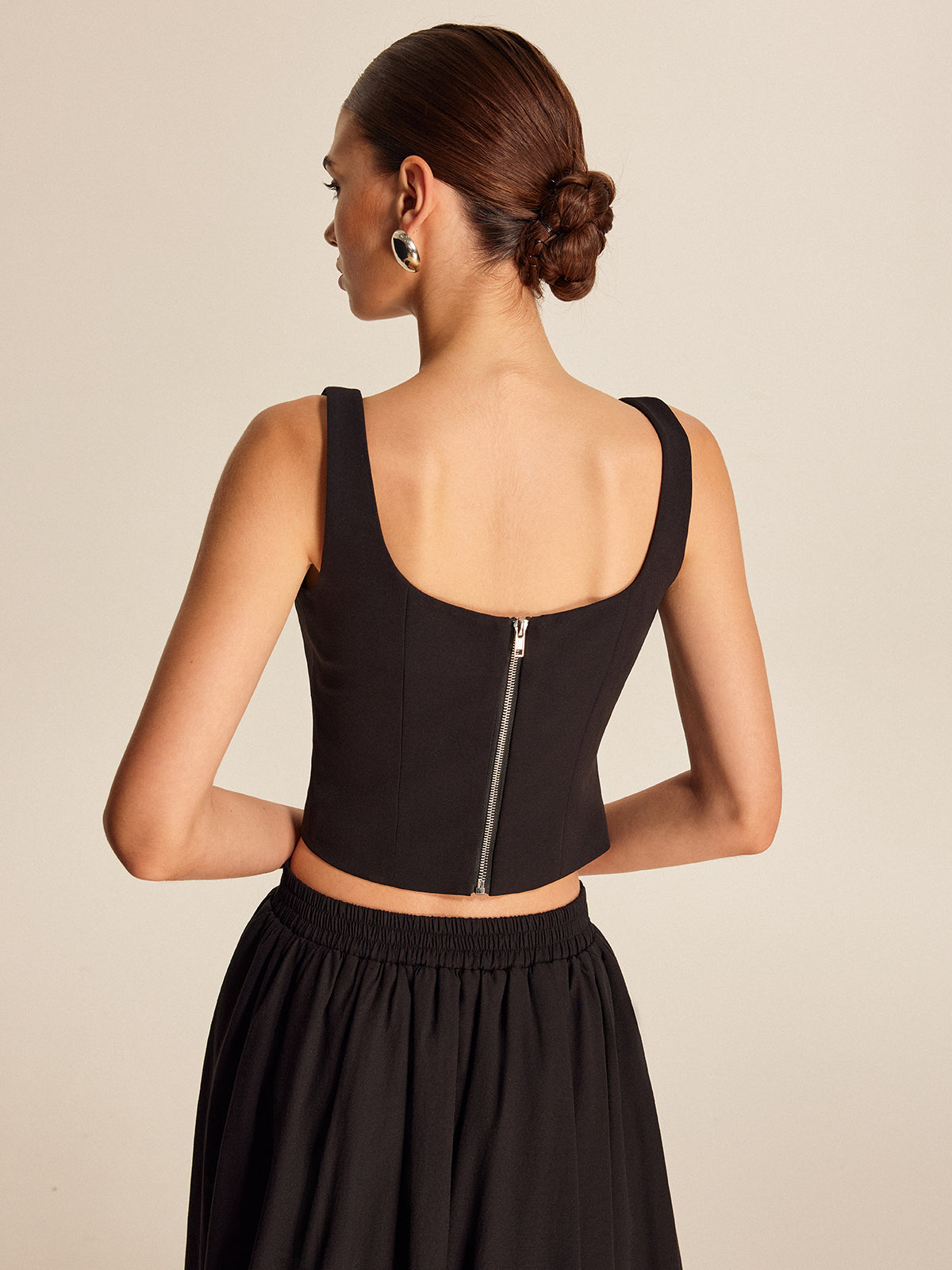 Haut à fermeture éclair au dos orné de cristaux floraux