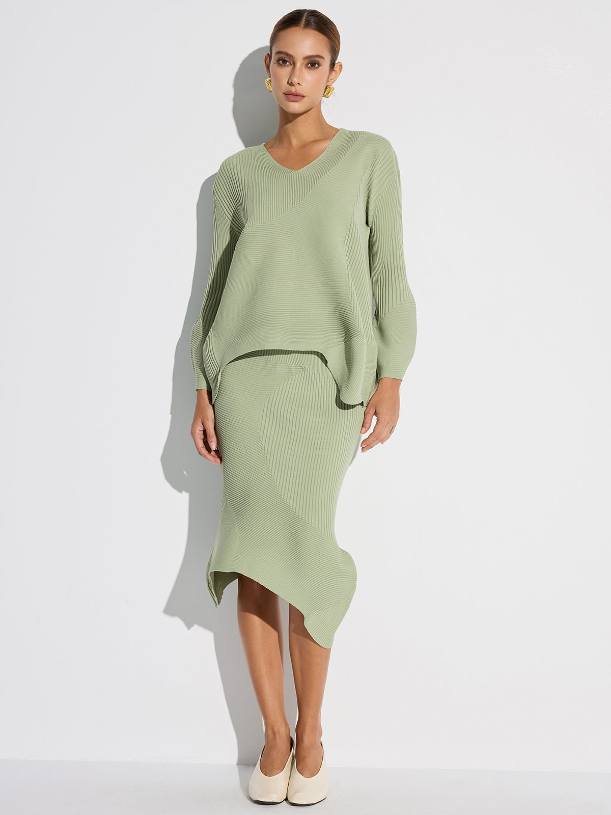 Strick-Midirock mit asymmetrischem Saum und Strukturmuster