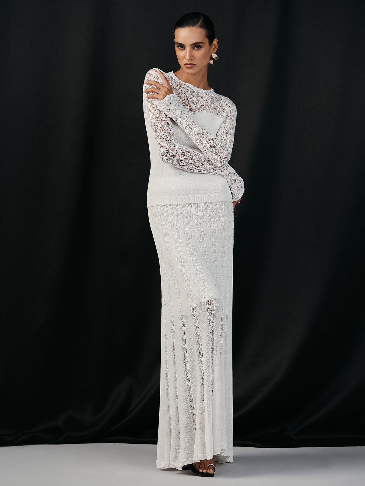 Maxirock aus Strick mit Spitzeneinsätzen